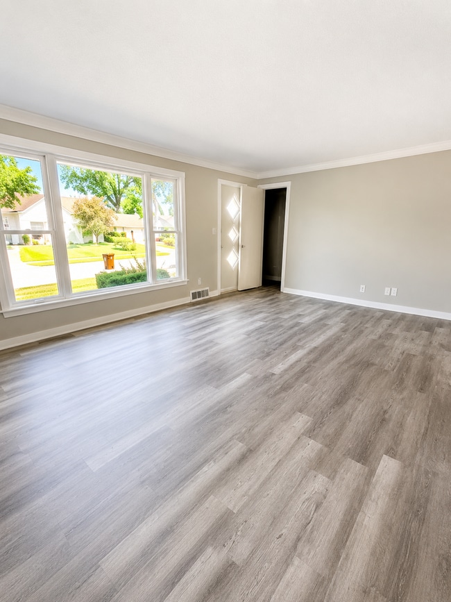 Building Photo - Charming 3BR Rental with Extra Living Space in Basement