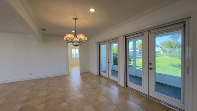 Building Photo - Lakefront 2BR Home in 55+ Leisureville Community
