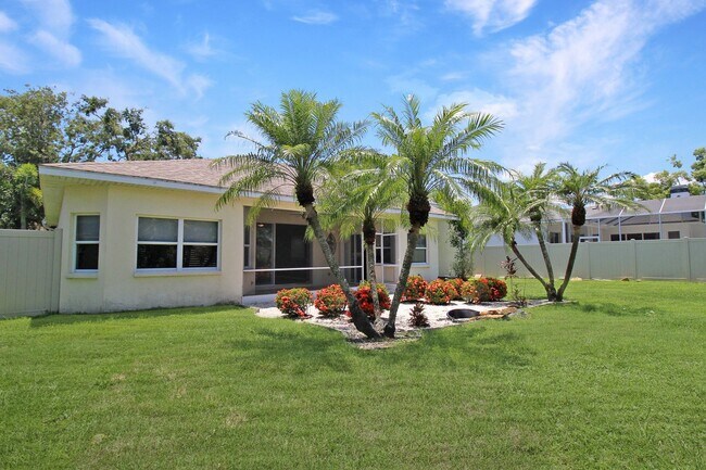 Building Photo - Annual rental: Spacious 3BR/2BA Creekwood Home with Office, Screened Lanai, EV Charger & Resort-S...