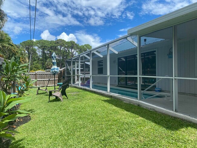 Building Photo - 3196 SW Areca Dr