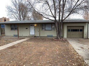 Building Photo - 4 Bedroom - 2 Bath, 1 Car Garage Home