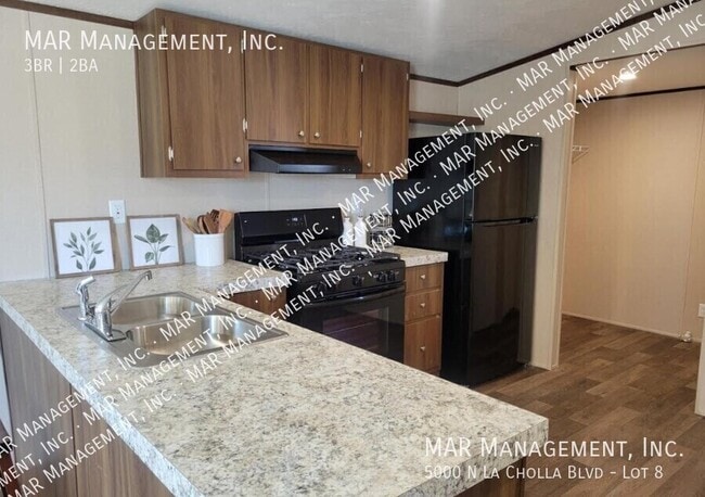 Building Photo - 5000 N La Cholla Blvd