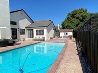 Building Photo - Stunning Home with Backyard Oasis with inground pool and spa