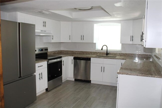 Building Photo - 10704 50th Ave N