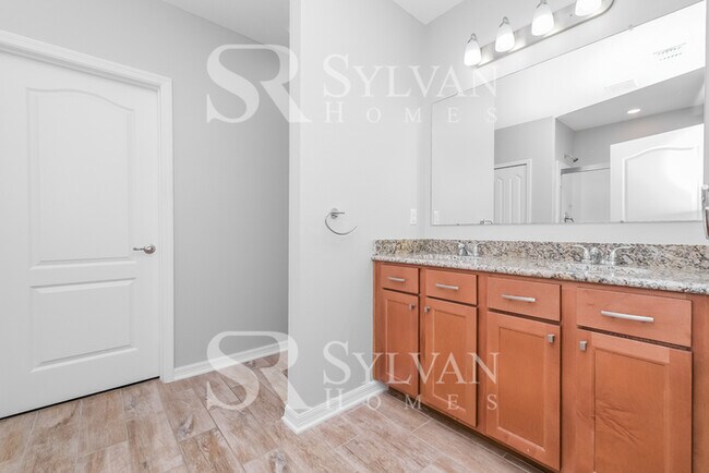 Building Photo - Feel welcome and comfortable in this charming home