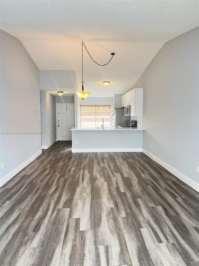 Building Photo - 10155 Boca Bend E