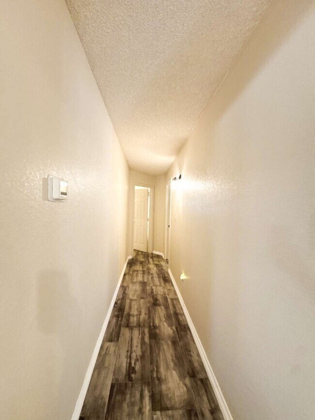 Building Photo - “Spacious 4-Bedroom, 2-Bathroom Home with Pool in Tamarack”