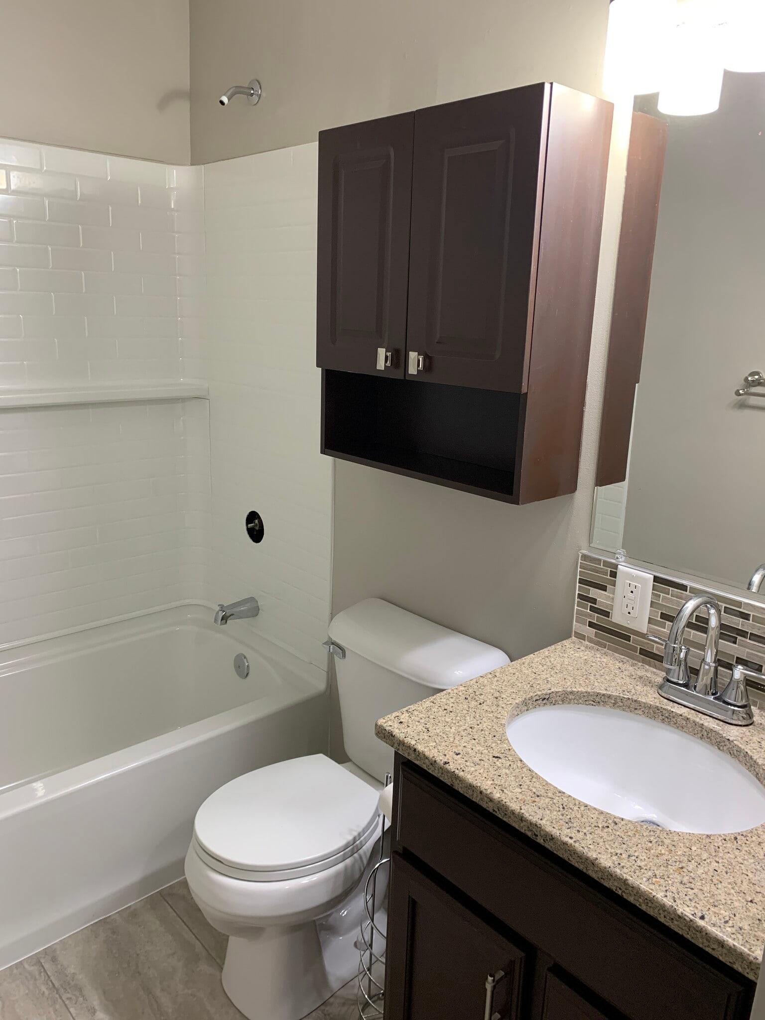 Brand new shower with granite sink and backsplash - 4832 Ginny ave