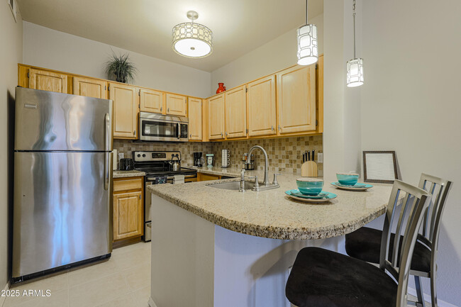Building Photo - 14950 W Mountain View Blvd