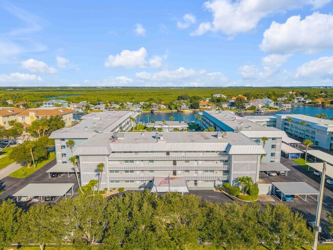 Building Photo - New Smyrna Fully Furnished 2BD/2BA Beach Condo in Waterfront Community!