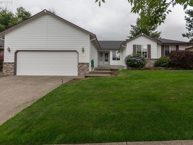 Building Photo - Charming 4-Bed, 2-Bath Home with Vaulted Ceilings, Dual Fireplaces & Serene Outdoor Spaces