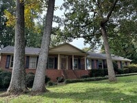 Building Photo - Four Bedroom Brick Home in Denver with finished basement and Seasonal Lake Views!