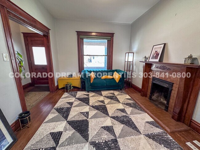 Building Photo - A home where old-world charm meets modern sophistication!