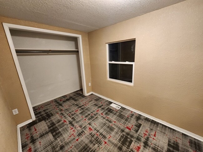 Building Photo - 4 Bedroom, 2 Bathroom home with large yard...