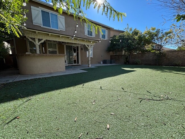 Building Photo - Grand 4-Bedroom Home with Entertainer's Yard in Gated River Village!