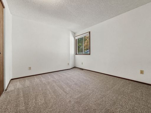 Building Photo - AVAILABLE FEBRUARY 1ST! Freshly Updated Kingsgate Home with Private Outdoor Space