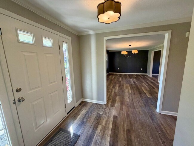 Building Photo - Modern Comforts Await: Spacious Rental with 2-Car Garage, Private Office, and Finished Basement w...