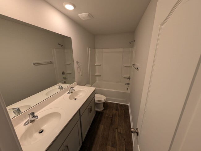 #1 full bathroom with double sink vanity. - 1682 Weatherend Dr