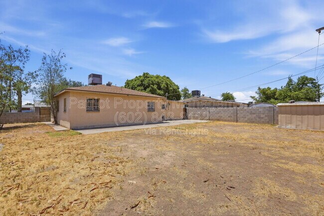 Building Photo - 6701 N 33rd Ave