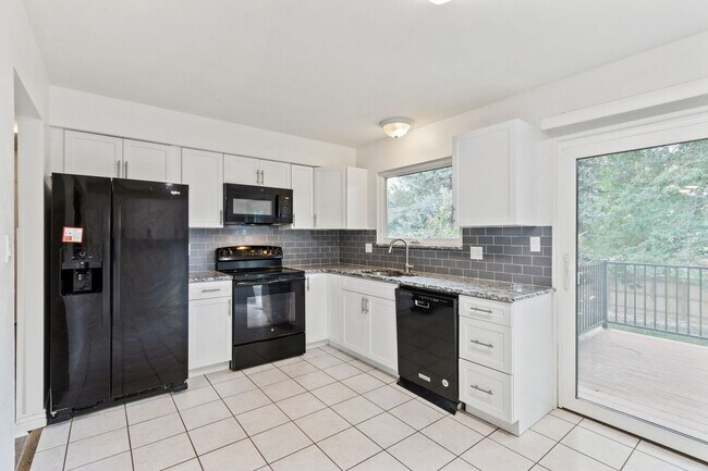 Building Photo - Updated 4-Bedroom Home