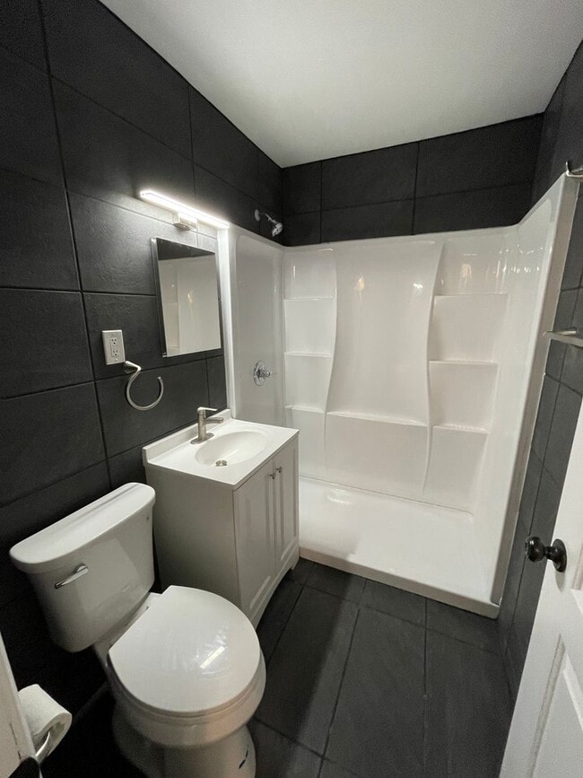 Building Photo - Newly Renovated 4-Bedroom Ranch with Basem...