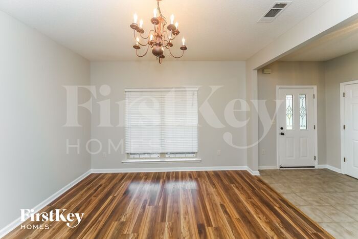Building Photo - 6358 Red Bird Dr