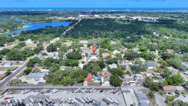 Building Photo - Rare Luxury Lease Opportunity | Spectacular 5-Bedroom Pool Estate on Nearly ¾ Acre Near Gulf Beaches