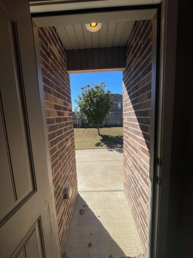 Building Photo - This Gorgeous All Brick and Stone Patio Ho...