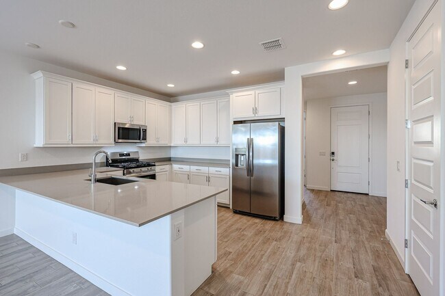 Building Photo - COMING SOON!! Recently built 5-Bedroom Home in Goodyear with Upgrades & Resort-Style Amenities