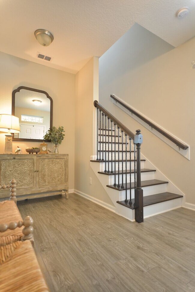 Building Photo - Beautiful Pond-Front Home Near Amelia Concourse