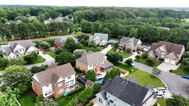 Building Photo - Beautiful brick home with a saltwater pool