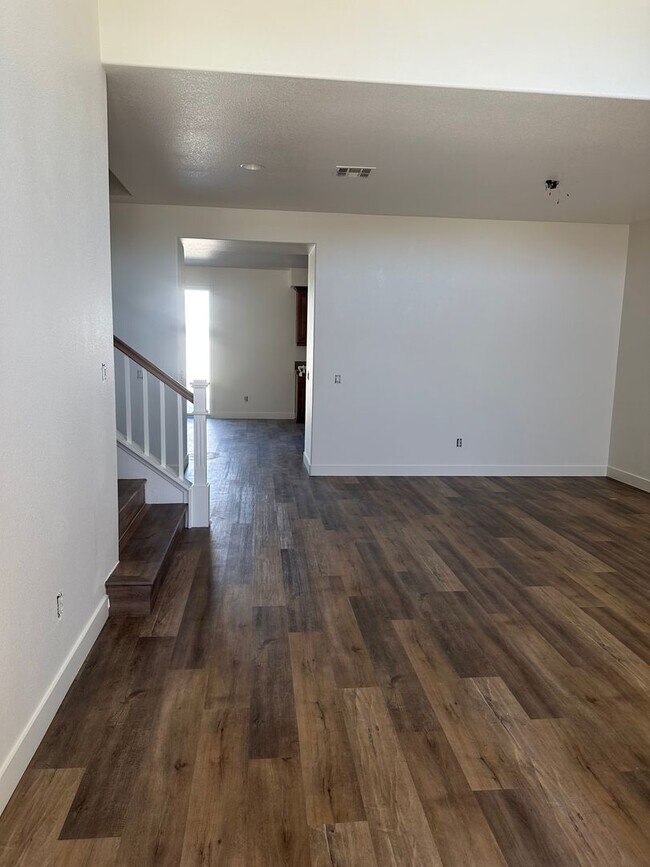 Building Photo - Two story home with 4B/2.5 bath, 3 car gar...