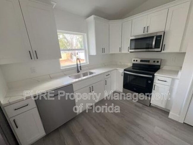 Building Photo - 5787 NW 62nd Ave