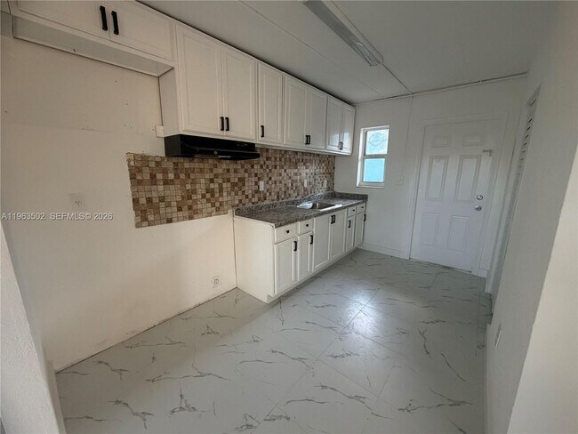 Building Photo - 301 NW 12th Ave