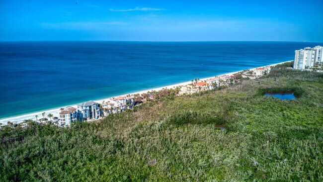 Building Photo - 7008 Pelican Bay Blvd