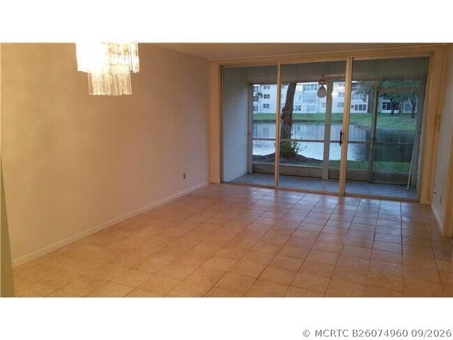 Building Photo - 6091 NW 61st Ave