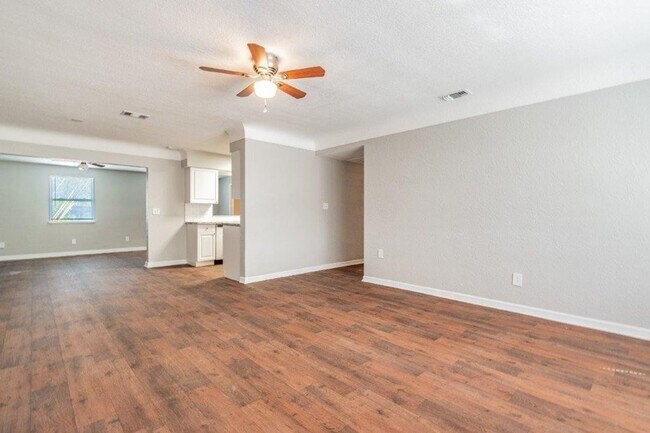 Building Photo - PRICE JUST REDUCED 3/2/1 1389 Sq. Ft. on a huge corner lot with granite & custom tile work!!