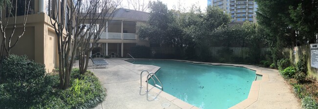 uncovered pool in season (deck has been cleaned and furniture updated) - 209 14th St. NE #119