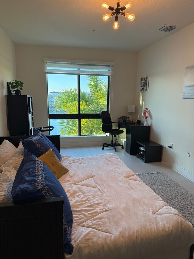 Building Photo - Premium Lake-View URBANA Residence Steps from Downtown Doral