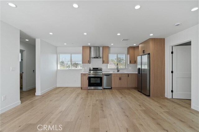 Building Photo - 11142 Woodley Ave