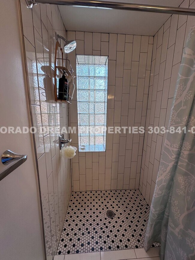 Building Photo - A home where old-world charm meets modern sophistication!