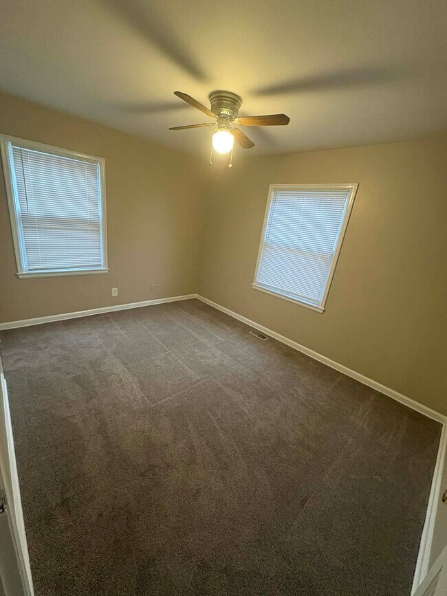 Building Photo - Welcome to Your Next Home with Harvest Investments!