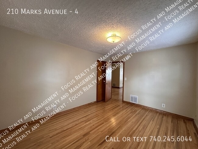 Building Photo - 210 Marks Ave