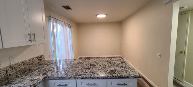 Building Photo - Remodeled Large 4 Bedroom 2 Bath Condo  in...