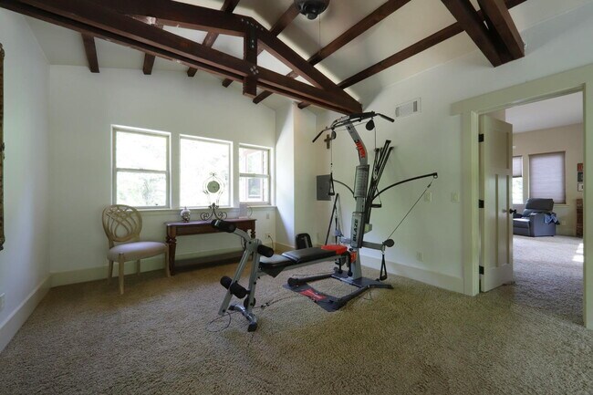 Building Photo - Don't miss this amazing opportunity to rent a higher end home nestled in the trees in the coveted...