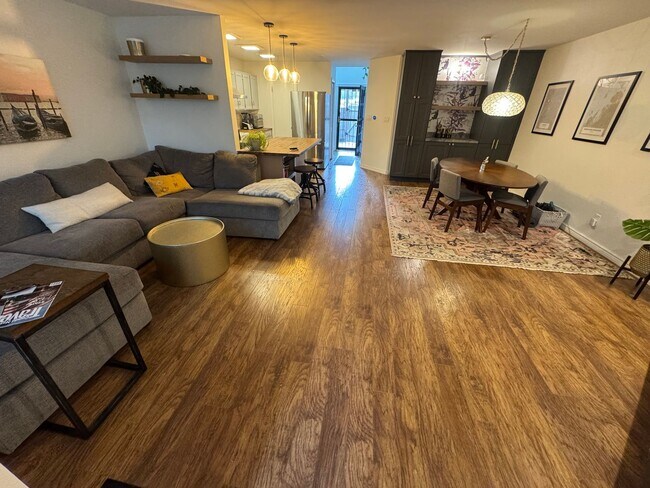 Building Photo - Bright 2BR Townhome with 3 Balconies & Private Patio