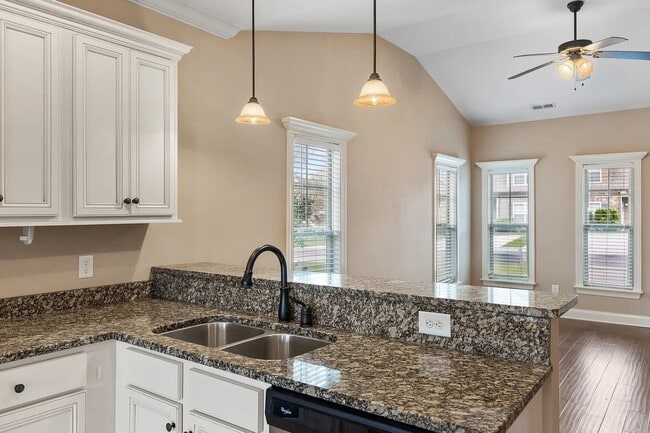 Building Photo - GORGEOUS FOURPLEX HOME - END UNIT