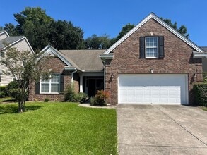 Building Photo - Available now. Great 4BR/3BA Home in Carol...