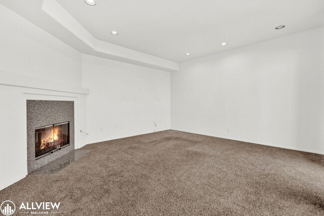 Building Photo - Spacious Coastal Condo with Rooftop Ocean ...