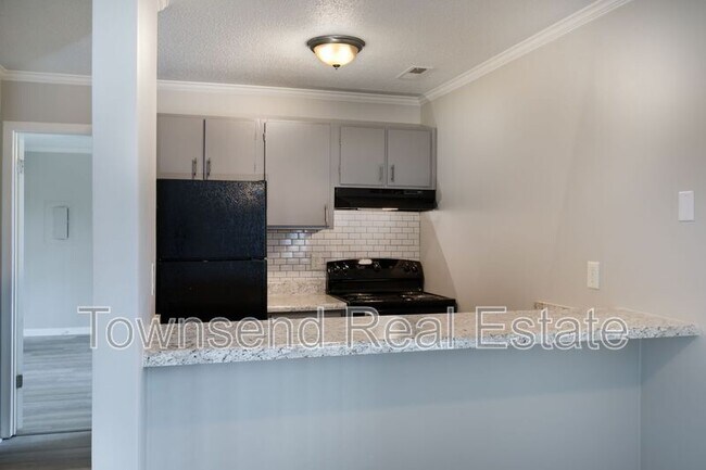 Building Photo - 5845-E Century Oaks Drive